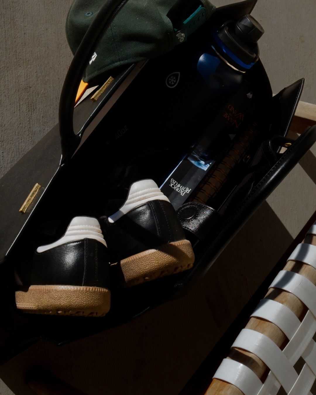 Black cowhide leather tote bag with gold hardware — the Take Me With You carryall by Felimon, designed for everyday use and timeless style.