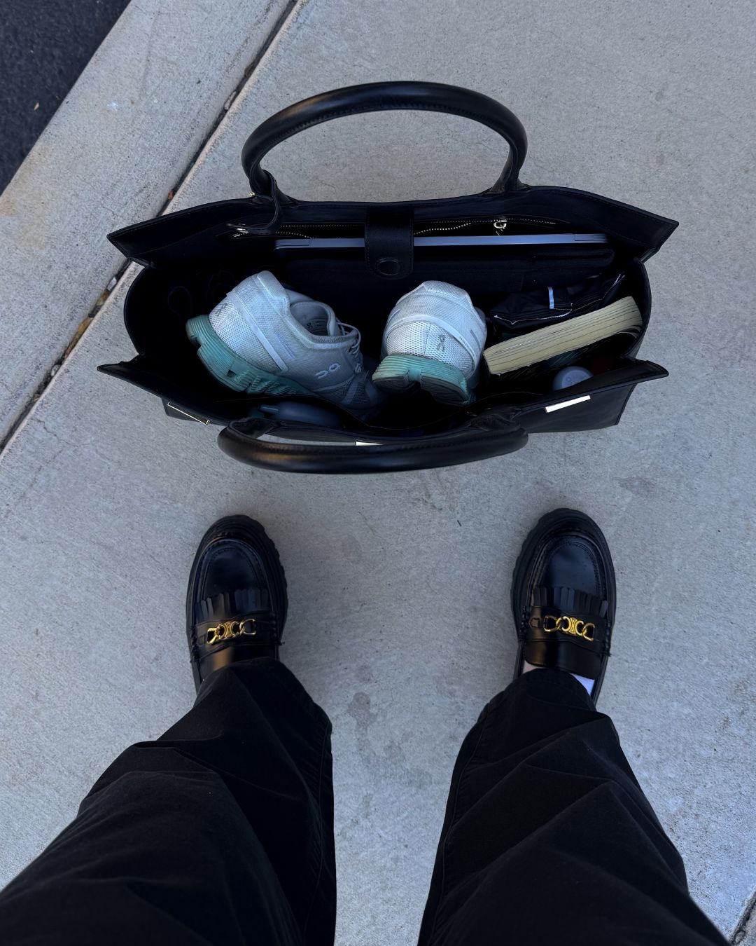 Black cowhide leather tote bag with gold hardware — the Take Me With You carryall by Felimon, designed for everyday use and timeless style.