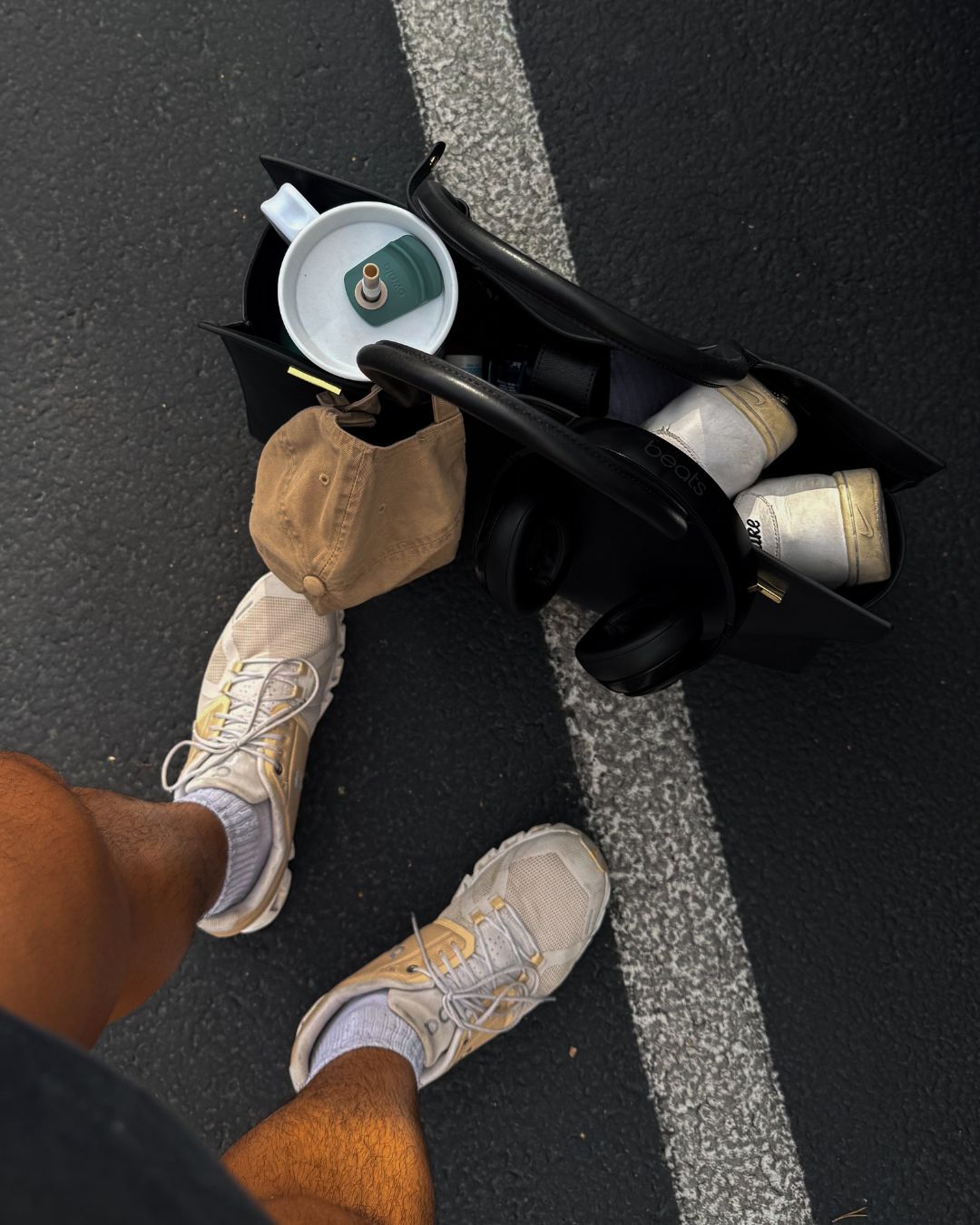 Black cowhide leather tote bag with gold hardware — the Take Me With You carryall by Felimon, designed for everyday use and timeless style.